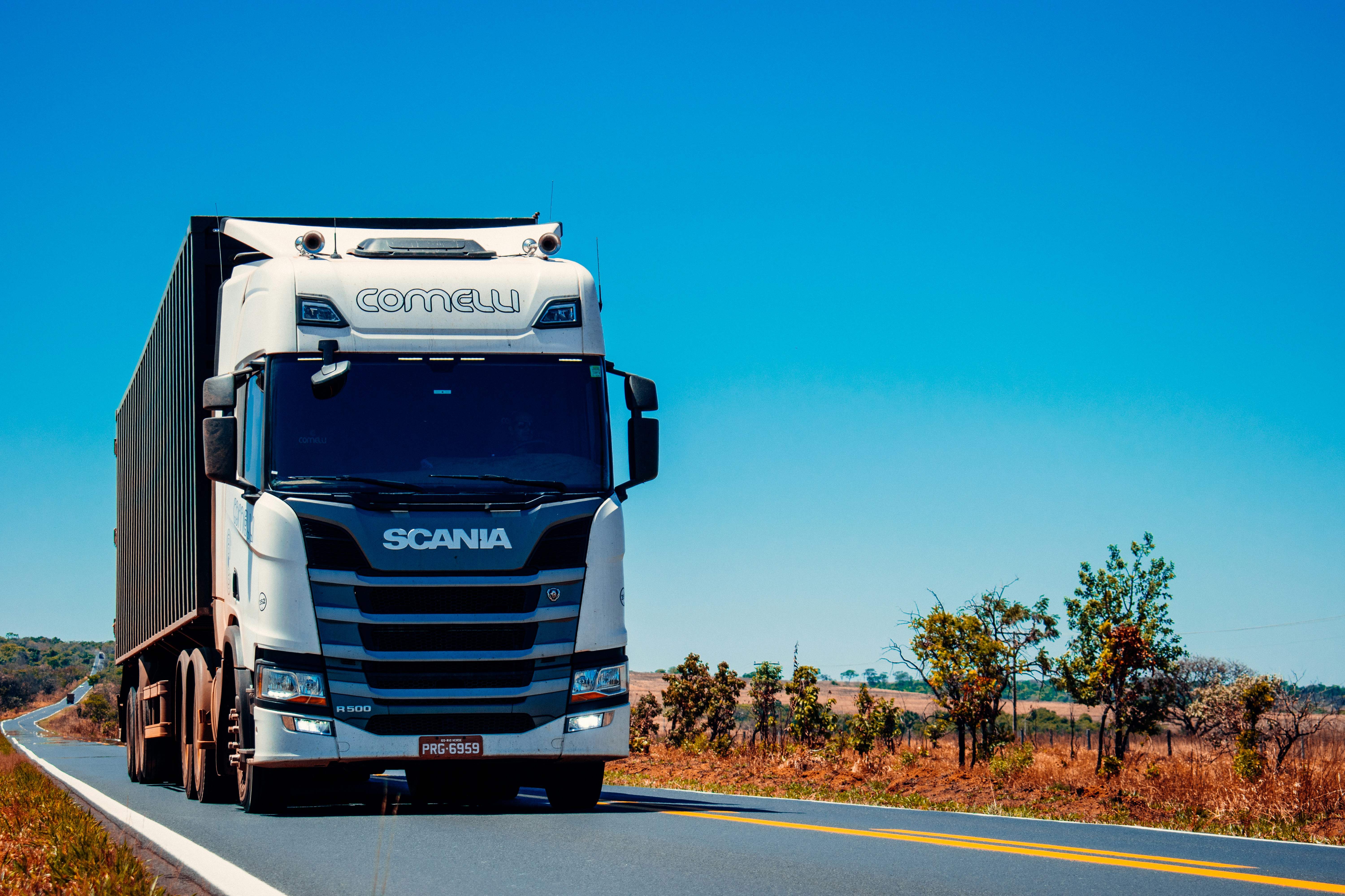Logistics truck departing a loading bay