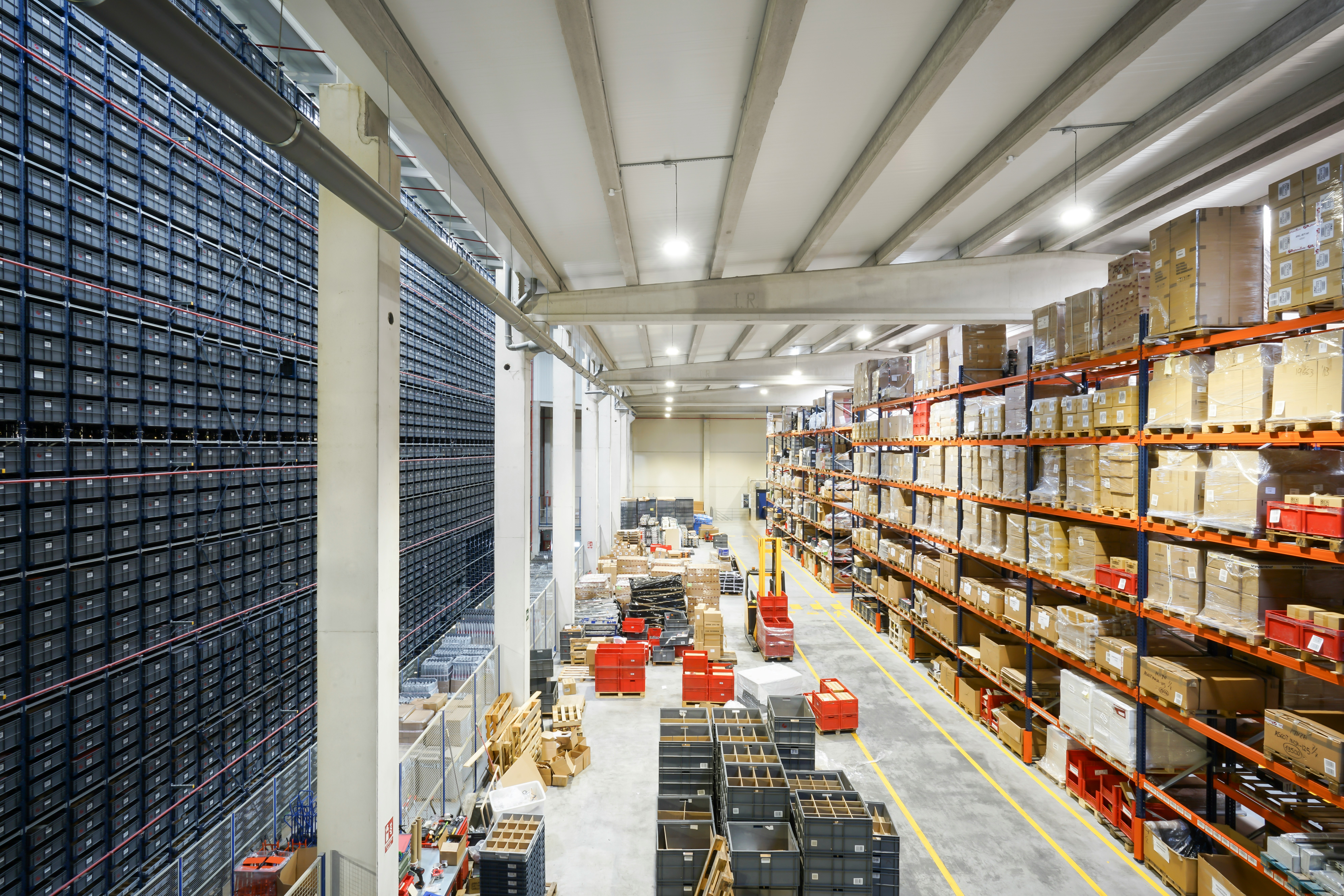 Inside a modern, expansive logistics warehouse